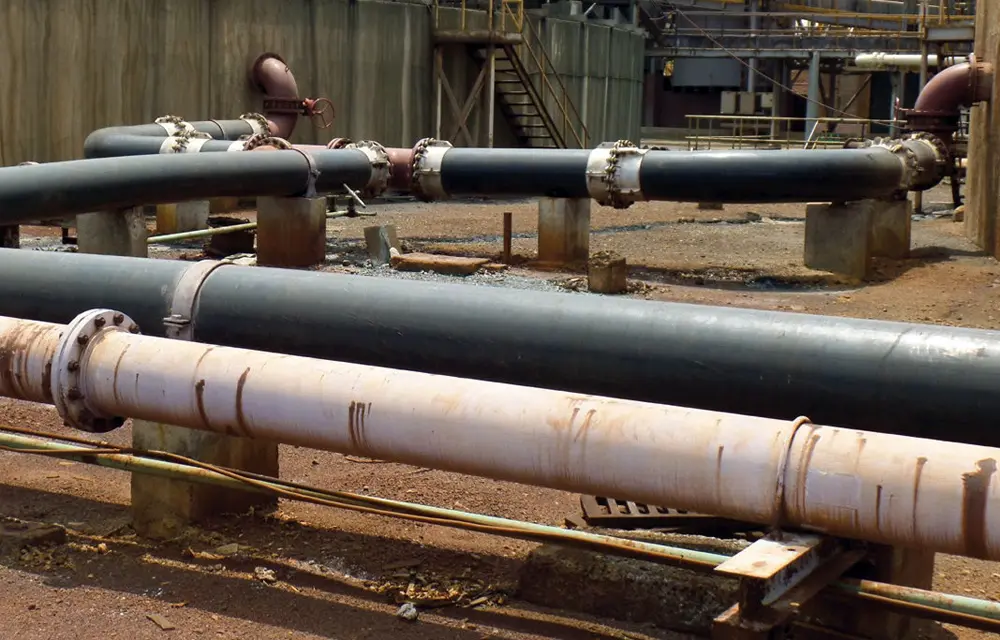 Transport of high corrosive material from the thickeners to the neutralization plant